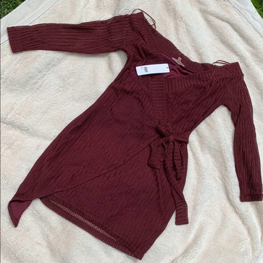 Bobbles and LaceMaroon dress with V neck line